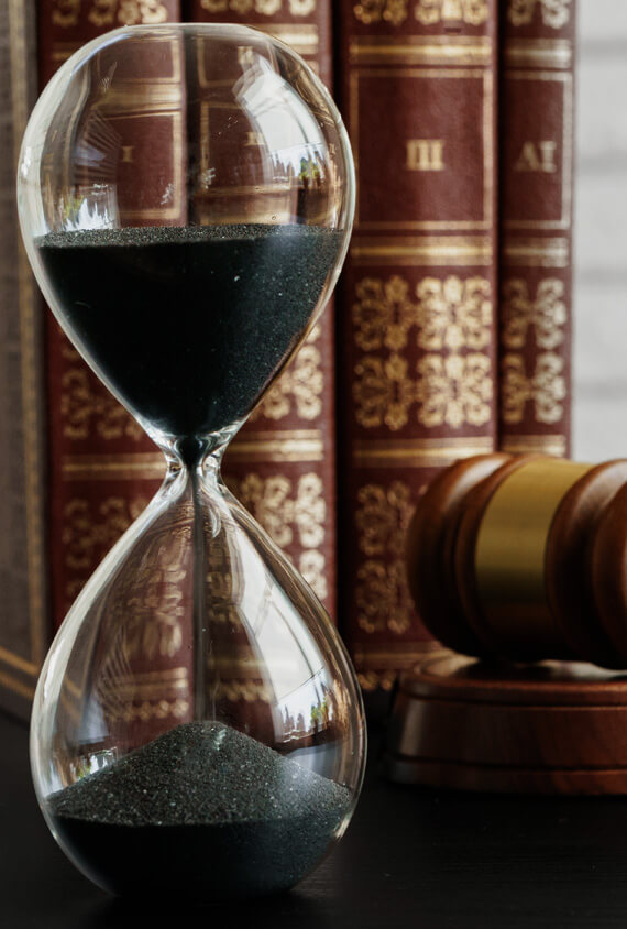 court-concept-hourglass-and-judge-gavel-on-table-C29WNTL.jpg